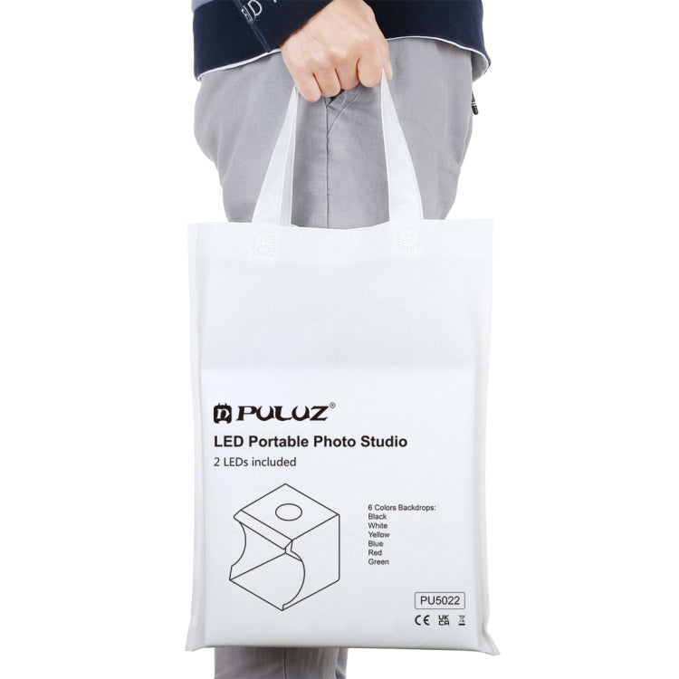 PULUZ 24cm x 23cm x 23cm 便攜式簡易摺疊攝影棚2x LED燈柔光拍攝台 配1條Micro USB線&6色背景布